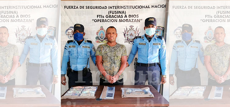 Detienen a hombre en posesión de arma y dinero en Puerto Lempira