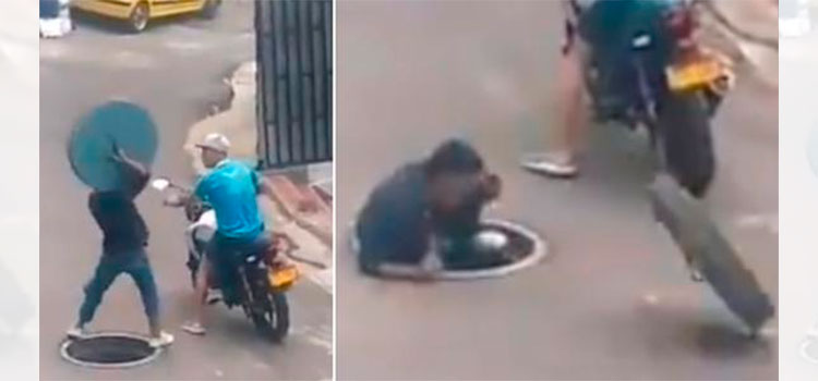 El momento en que un hombre intenta robar la tapa de una alcantarilla y tiene un final inesperado