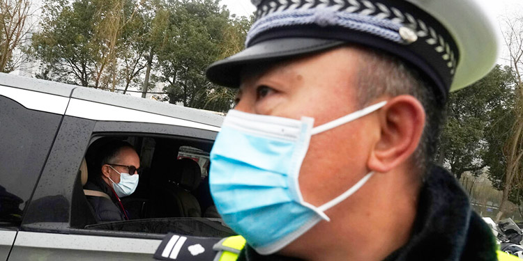 Investigadores de las OMS buscan pistas en mercado de Wuhan